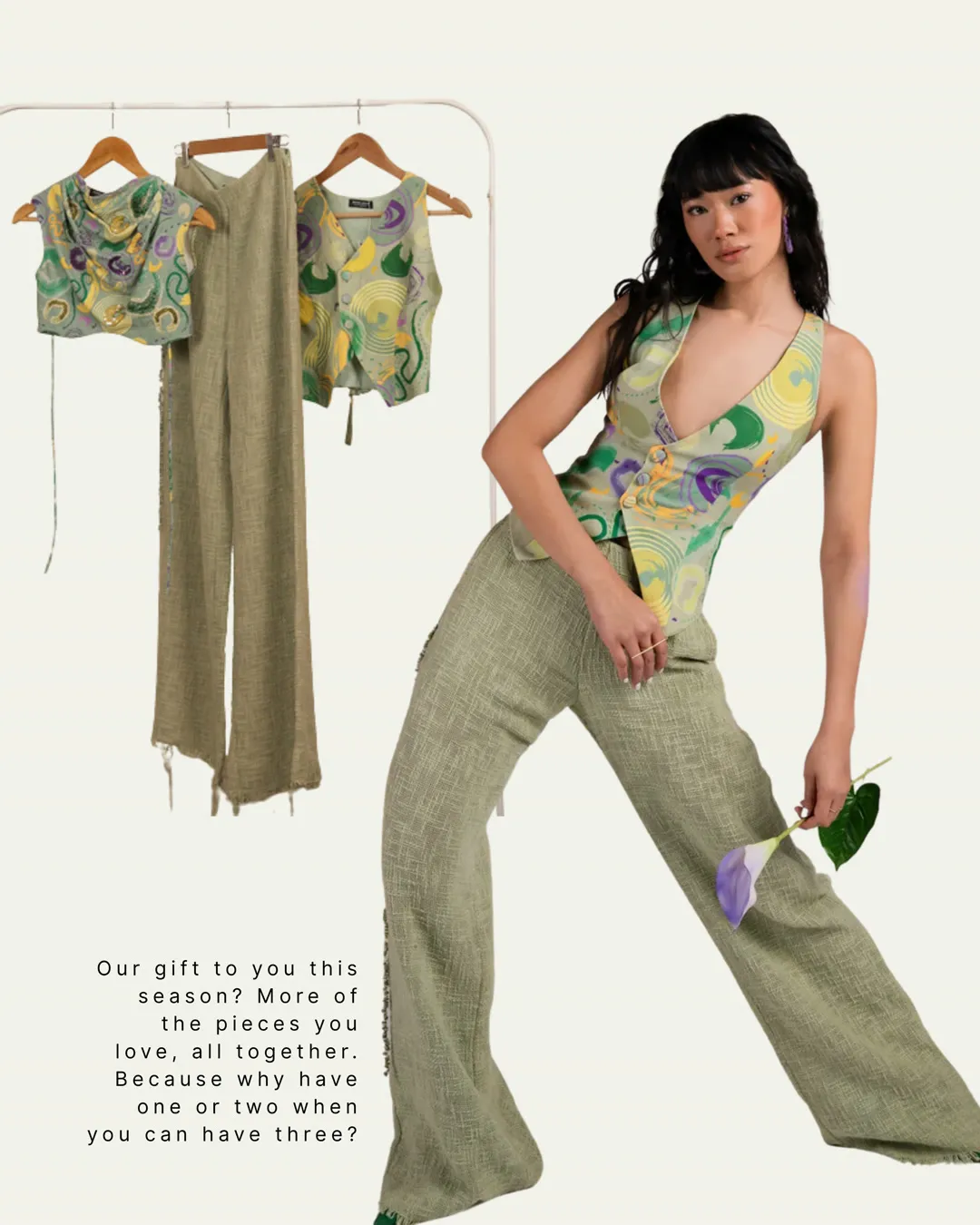 A printed top and green trousers, on hangers and worn